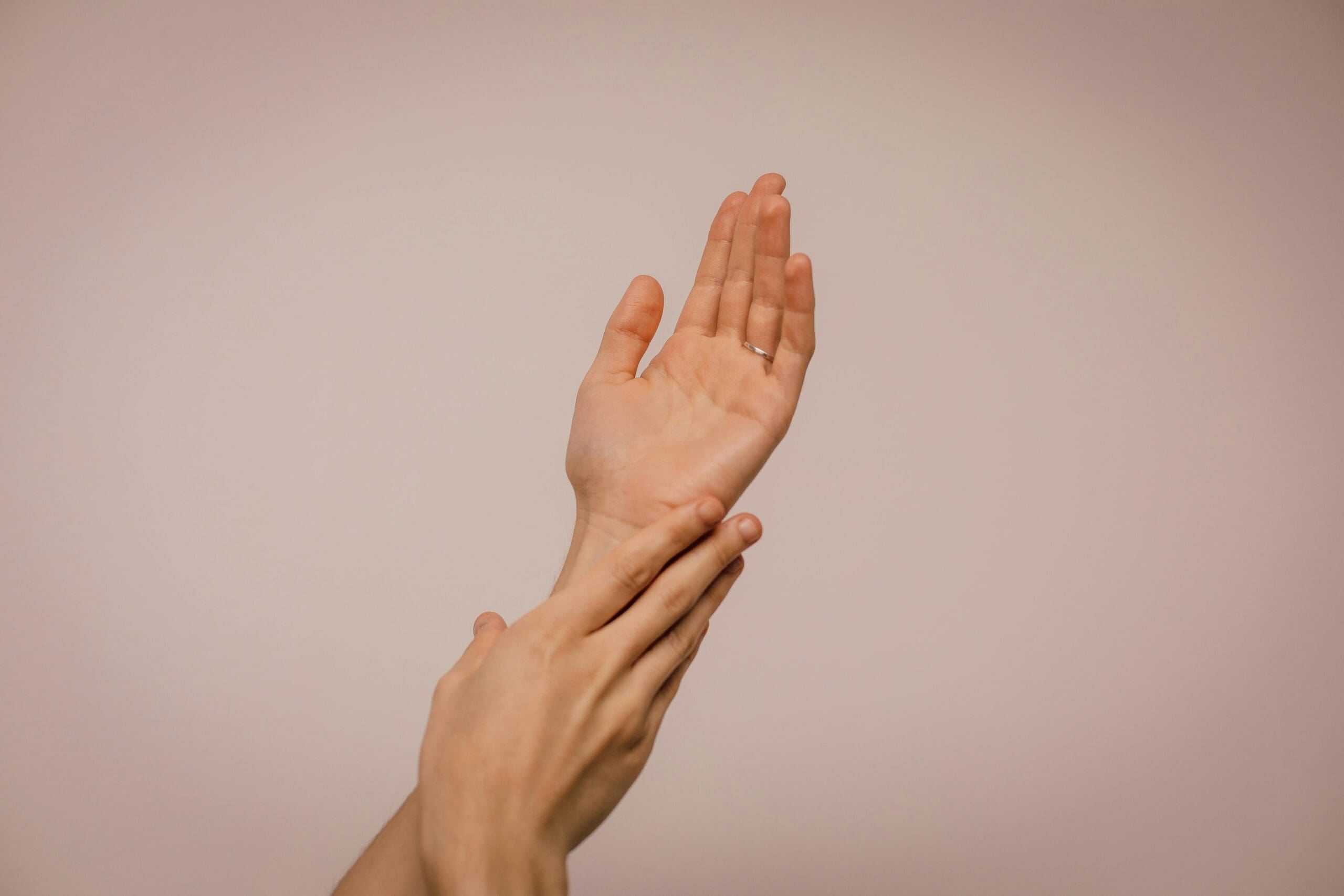 Hands gently interacting, symbolizing the connection between spa service providers and potential clients through online marketing efforts. #marketingstrategy #spaclientele #digitalmarketing