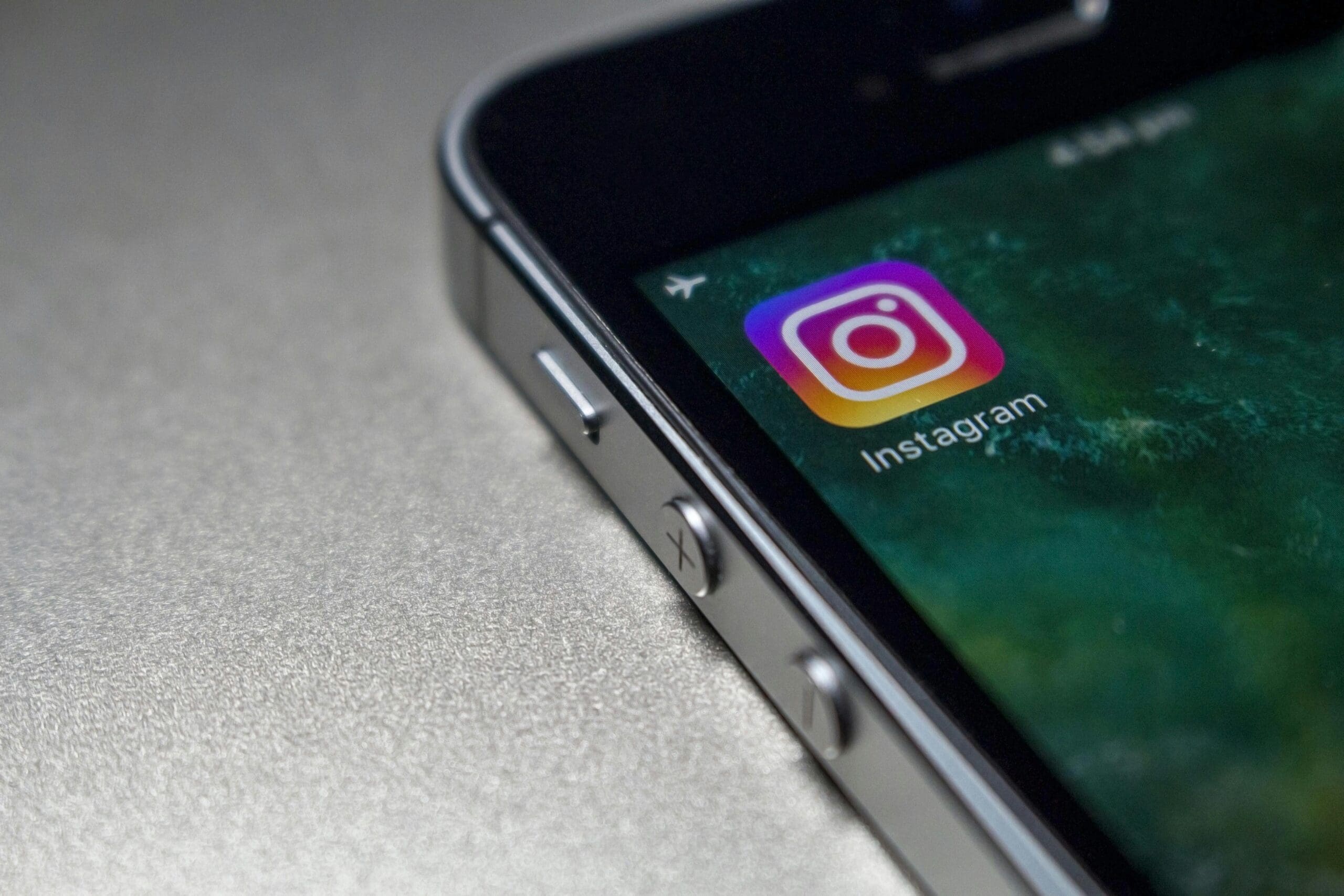 Close-up of the Instagram app icon on a smartphone. This image visually represents a key social media platform for repurposing blog content to expand reach and engagement. #instagrammarketing #socialmediastrategy #contentrepurposing